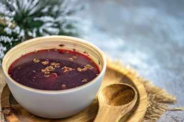 Traditional Polish soup made of red beetroot - red borsch - top view - copy space.