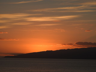 sun setting over the sea