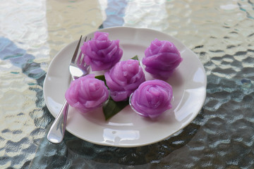 Purple layer sweet cake (Khanom Chan), Thai traditional dessert in rose shape 