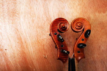 The construction of violin,Scroll,Pebgox and neck,on wooden board © Watcharin