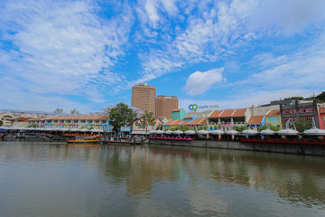 Fototapeta premium Historical quay on the Singapore River. Moored ships on the pier on September 25, 2016