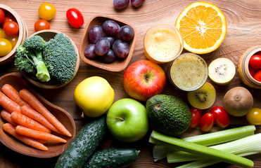 Natural vegetables and fruits on wood.