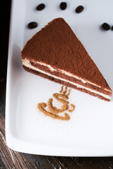 Tiramisu dessert on a porcelain plate