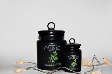 beautiful black spice jars with garland