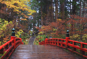 Haguro Mt, Tsuruoka, Japan - November 11, 2018: Red bridge at Haguro Mountain