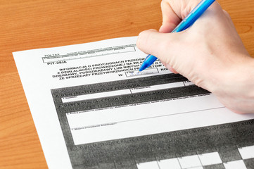 Filling polish peper tax form PIT-28/A.