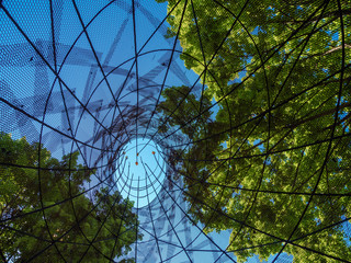 Trees seen through street sculpture, Columbus Indiana