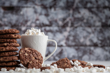 Coffee drink with marshmallows and homemade cookies.