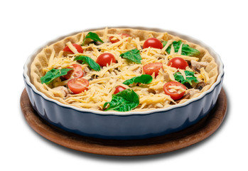 Traditional quiche tart in baking form with filling