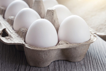 Fototapeta na wymiar White chicken eggs close up. Toned.