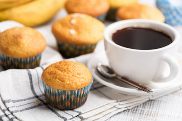 Banana muffins and cup of coffee
