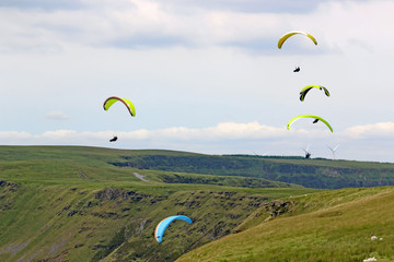 Paragliders flying in the Welsh Valleys