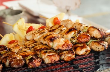 Pork and Chicken Barbecue with Tomatoes and Pineapple