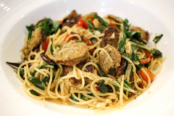 Closeup - Blurred image : Spaghetti with Grilled Sausage