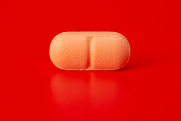 tablets, pill , red background
