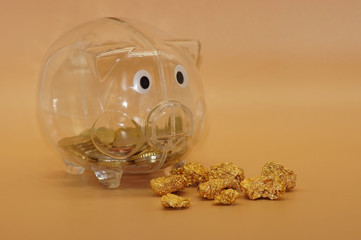 Gold als Geldanlage sparen auf neutralem Hintergrund