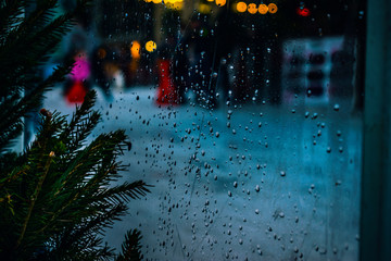 rain drops near a Christmas Tree melancholia concept heavy atmospheric emotional composition  