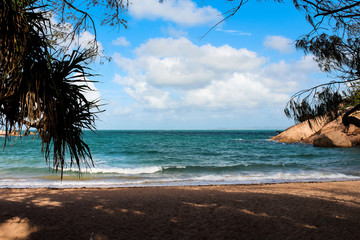 Hidden Australian beach on Magnetic Island during a calm spring day with no people (Magnetic Island, Townsville, Queensland, Australia)