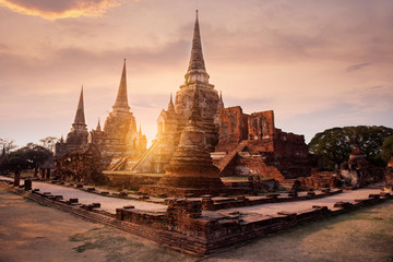 Fototapeta premium Ayutthaya Historical Park heritage landmark temple in Ayutthaya, Thailand while sunset.