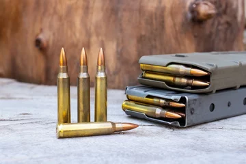 Foto auf Acrylglas Antireflex assault rifle bullet © singha103