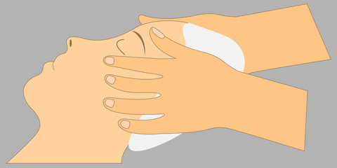 Woman relaxing and having a face massage