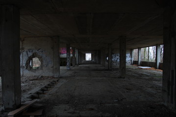 Fototapeta na wymiar Urbex, corridor of decay barracks building 