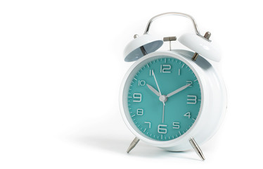 Narrow focus to clock with time 10 past 12 or 10.00 AM PM, turquoise clock face, on white background - obrazy, fototapety, plakaty