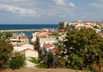 Fototapeta na wymiar View of the road to the sea through the houses, Chania