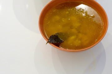 soup with bread, white tabel background