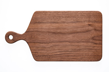 Handmade walnut chopping board. Walnut chopping board texture background.	