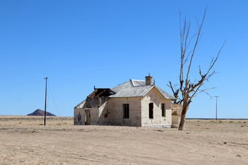 Old abandoned house at the railroad track in Namibia
