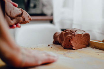 Help children during baking and cooking. The child helps to prepare the dough for baking. Baking cookies, family baking together. Flooding, making cookies. The concept of cooking.