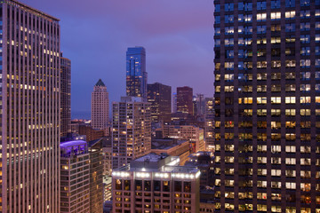 View of skyscrapers and buildings in downtown Chicago after sunset with amazing blue and pink sky