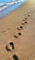 Footprints on the sandy beach