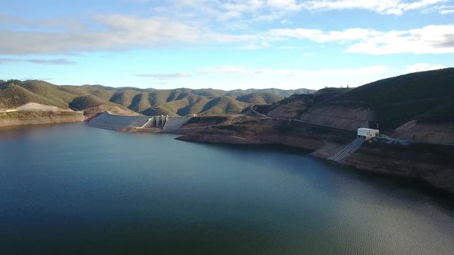 Aerial. Portuguese hydroelectro dam Odelouca, in mountains of Monchique. Algarve Portugal.