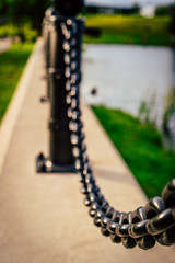 Closeup view of Metal Chain in the Park - Colorful Photo