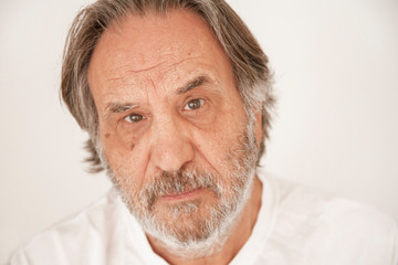 Portrait elderly man on white background