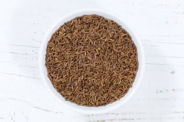 Kümmel Gewürz von oben Holzbrett