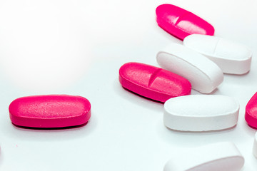 colorful medical pills, on white background, closeup