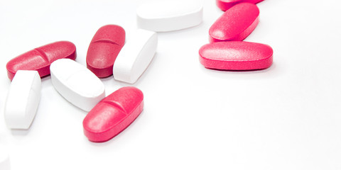 colorful medical pills, on white background, closeup