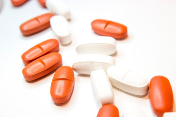 colorful medical pills, on white background, closeup