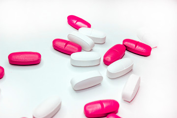 colorful medical pills, on white background, closeup