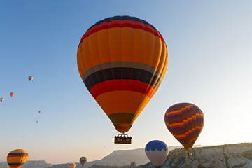 Fototapeta premium Air balloon flight over the mountains