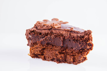 Chocolate cake - a slice on a white background