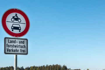 Traffic sign which allows agricultural and forestry vehicles to drive through