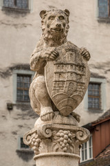 Stone fountain with a bear and a shield