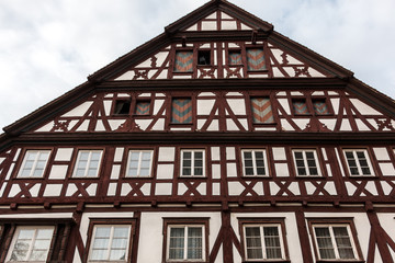 Old historical building and half-timber house with brown wood