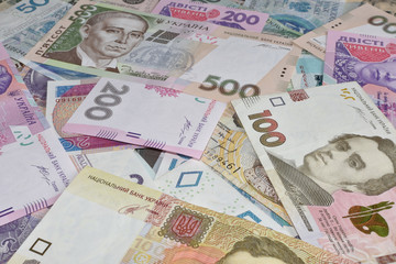 Fototapeta na wymiar Ukrainian Hrivnas (Hryvnias, UAH) banknotes, closeup, background