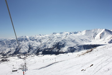 ski chair lift in blue sky