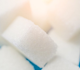 white sugar cubes close up background